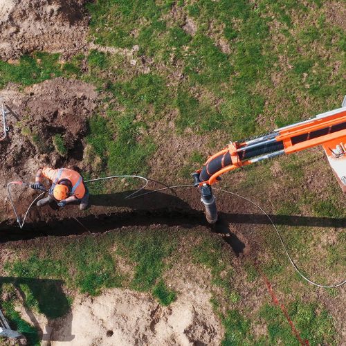 a hydro excavation technician working with the equipment